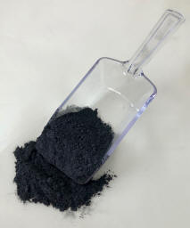 graphite powder on a scoop